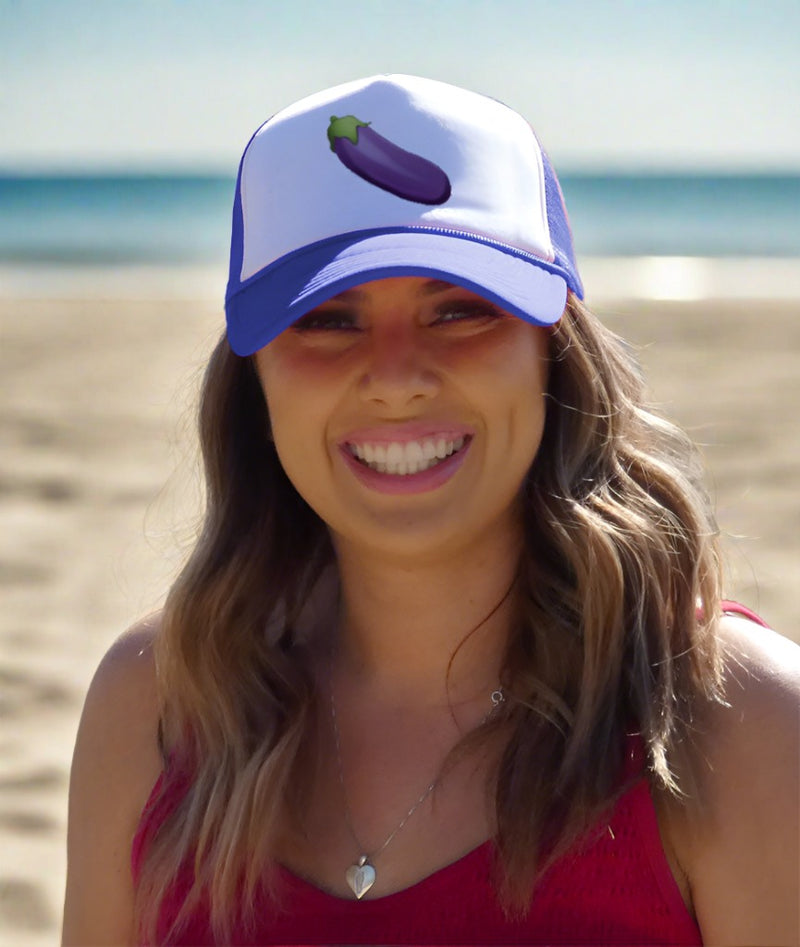 Girl smiling wearing a Boner Eggplant trucker cap